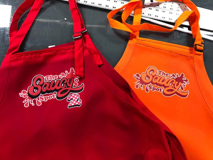Full color logos on apparell and aprons.